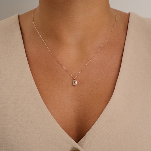 Oval Morganite and Diamond Halo Pendant