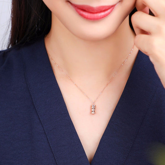 Cylindrical lock necklace in 18kt rose gold