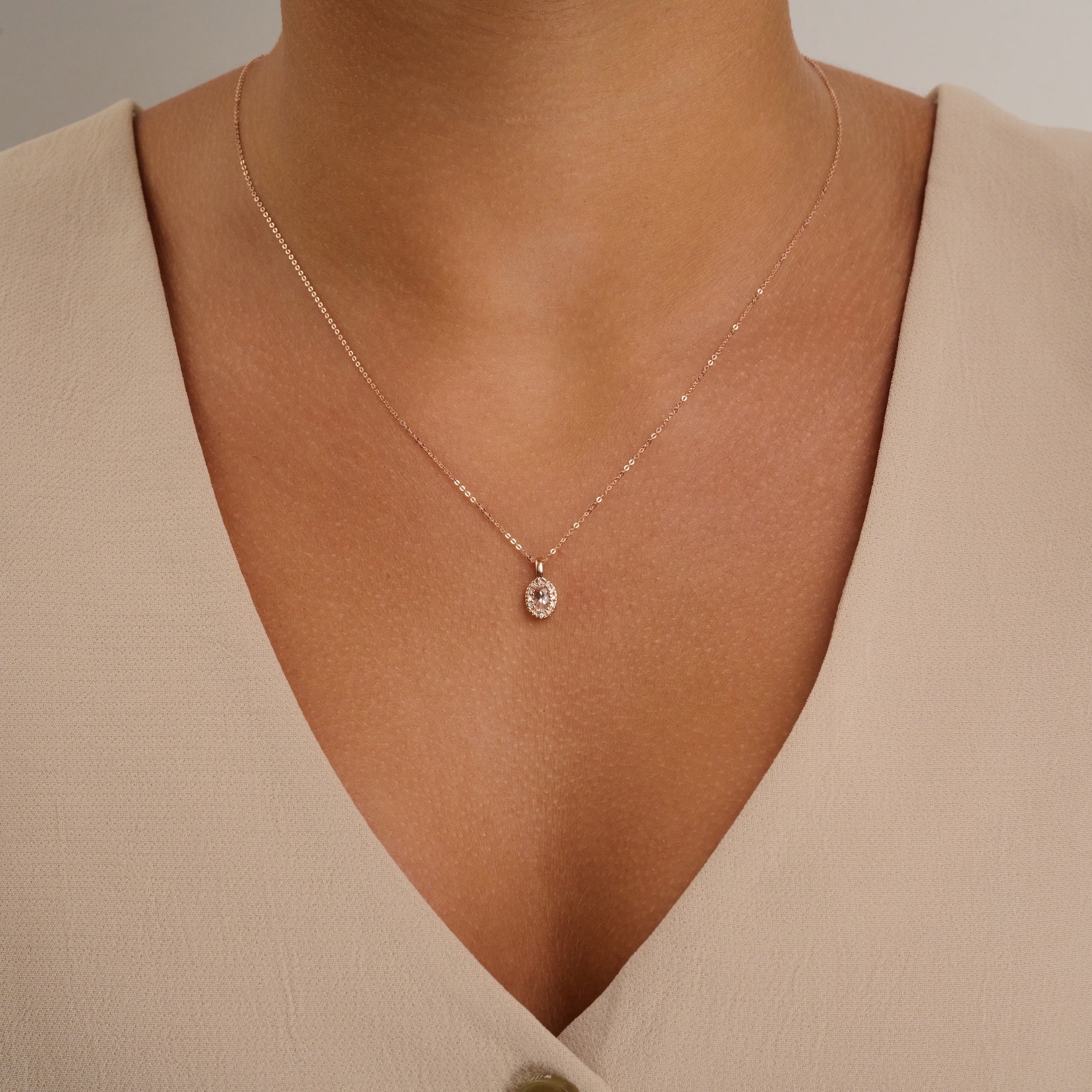 Oval Morganite and Diamond Halo Pendant