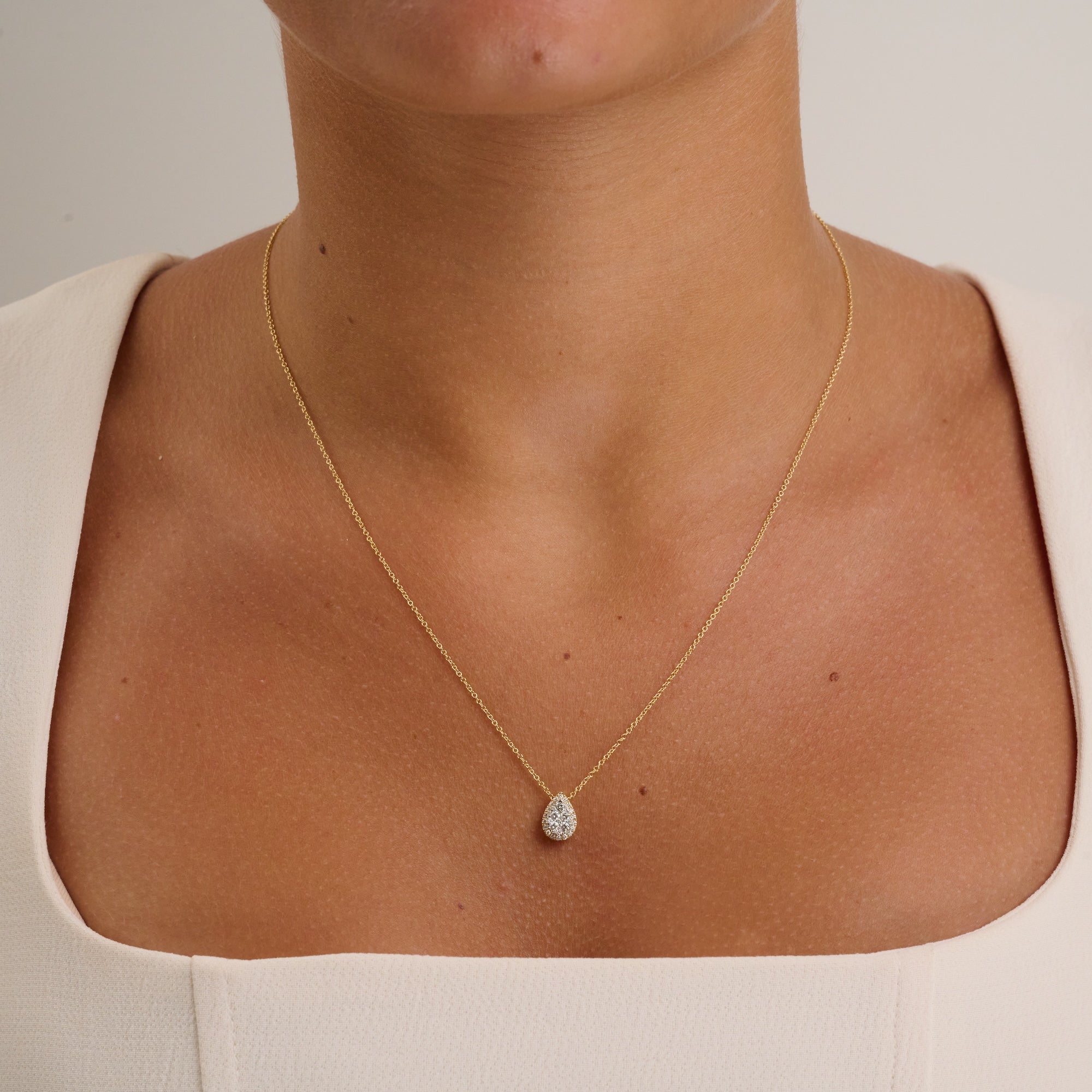 Halo Pear Shape Diamond Pendant