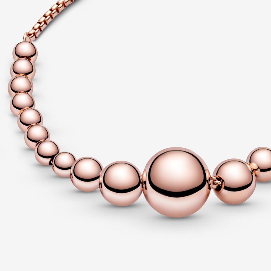FINAL SALE - String of Beads Slider Bracelet, Rose gold plated