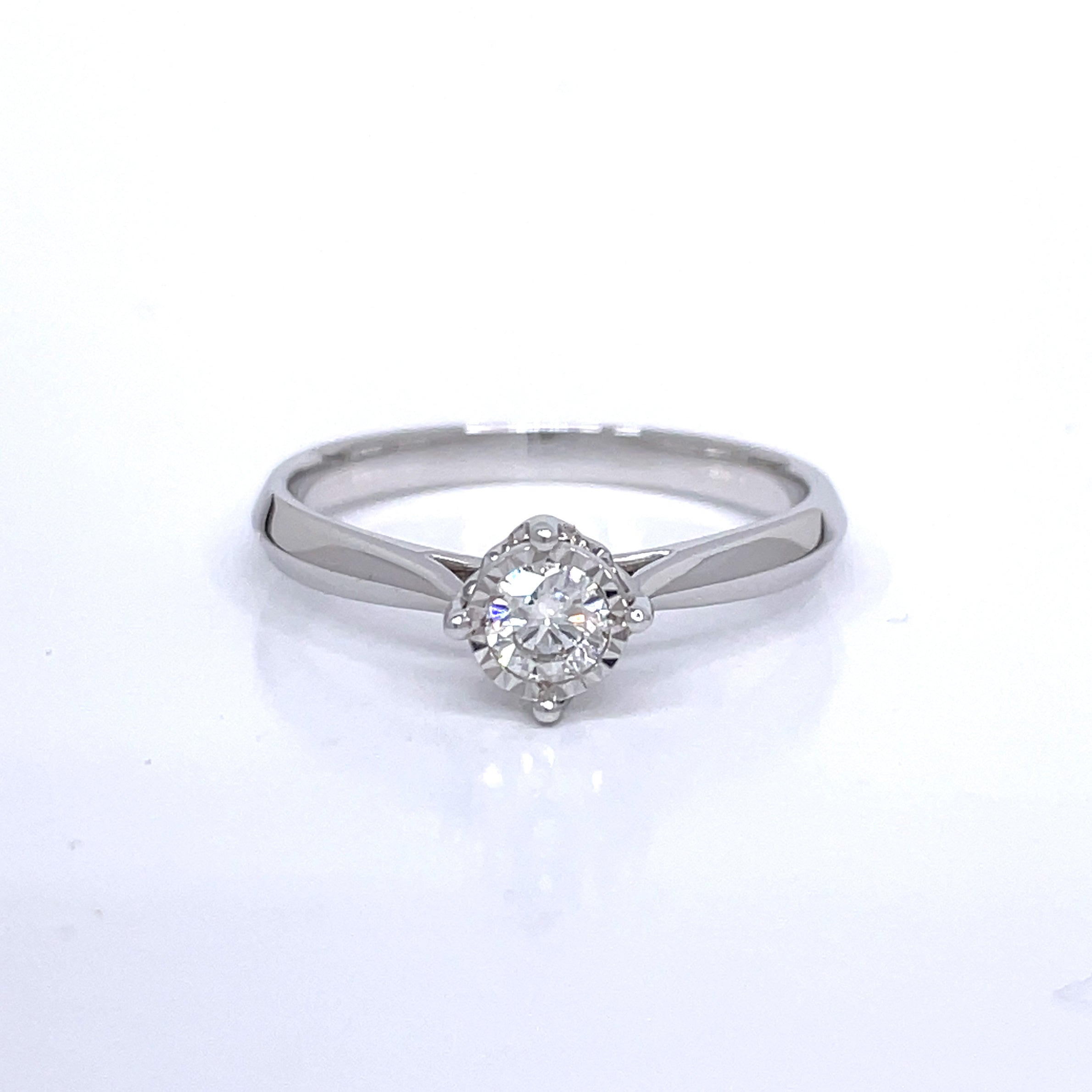 0.19ct Petite Diamond with Diamond Cut Gold Halo Engagement Ring in 18k
