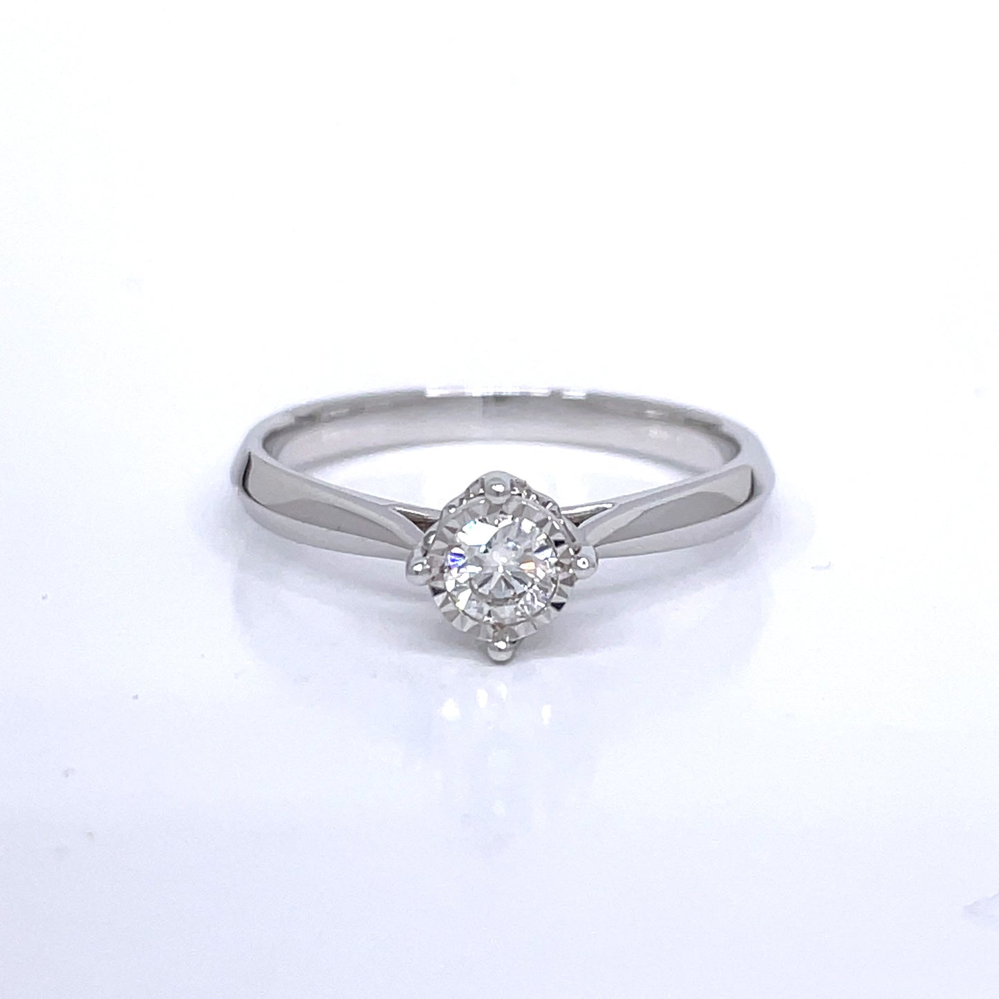 0.19ct Petite Diamond with Diamond Cut Gold Halo Engagement Ring in 18k