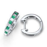 GREEN EMERALD AND DIAMOND HUGGIE HOOPS IN 18KT WHITE GOLD