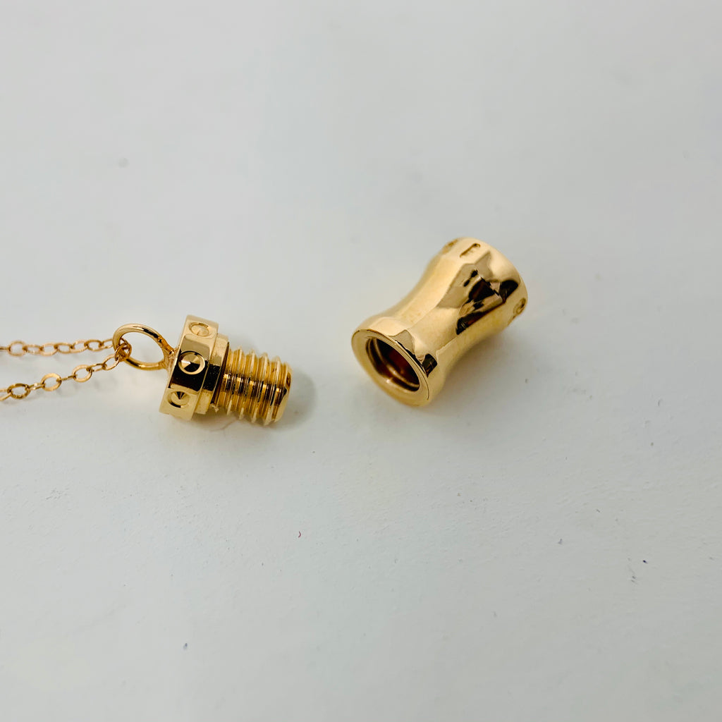 Cylindrical lock necklace in 18kt rose gold